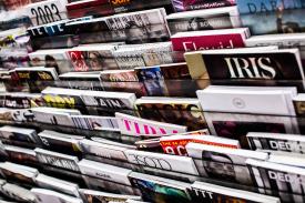 Magazines in kiosk. Foto door Charisse Kenion via Unsplash Magazines in kiosk. Foto door Charisse Kenion via Unsplash